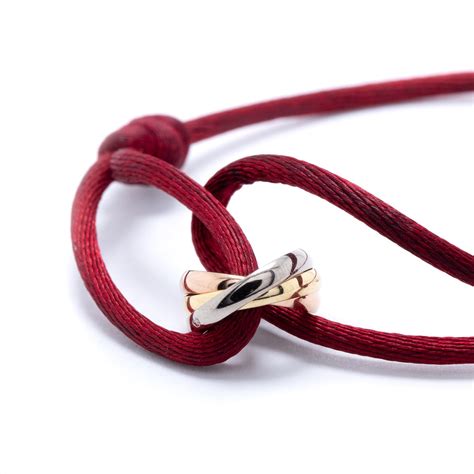 cartier trinity bracelet on silk cord replica|cartier trinity bracelet price.